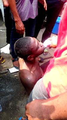 Photos: Mob feeds thief yogurt after serious beating