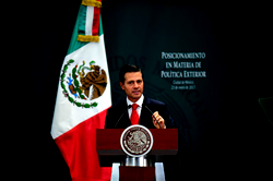 Mexican president condemns Trump’s wall plan, vows to protect migrants