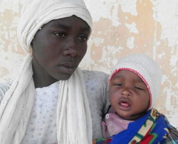 Troops recover another Chibok school girl with child