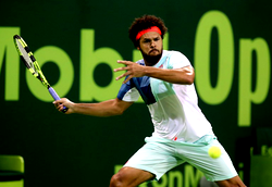 Tsonga through after second set scare in Doha
