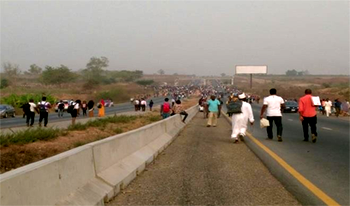 UniAbuja students block Airport road over death of colleague