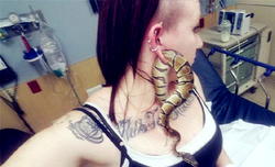 Girl gets python stuck in her earlobe