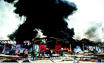 Fire guts warehouse, mechanic village, building in Lagos