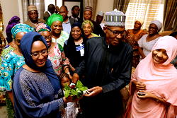 Mrs Buhari receives her husband amid cheers, thanks