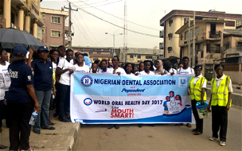 Stakeholders stage walk to promote oral hygiene practices