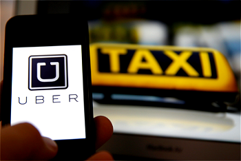 Seamless payment for riders drives Uber, Visa to multi-year partnership