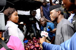 Ag President Osinbajo prices fish, onions, rice and beans at Garki market