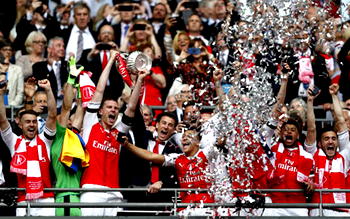 FA Cup hero Ramsey calls for Wenger to stay