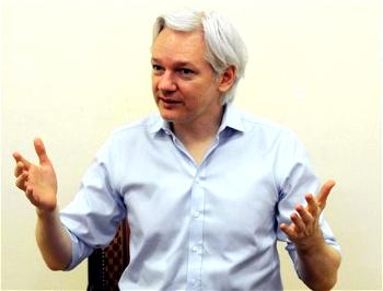 Rape charges dropped but Assange faces arrest in Britain
