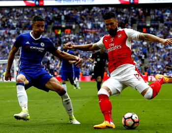 Ramsey fires Wenger to record seventh FA Cup