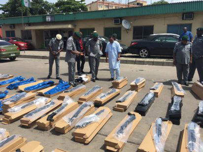 Photos of 440 pump action riffles intercepted by Customs