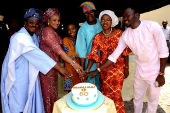 Ajimobi, wife celebrate media aide, Yomi Layinka, at 60