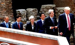 G7 draft: Governments have a sovereign right to curb migration