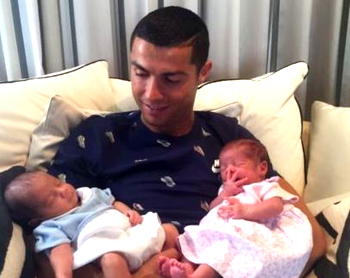 Photo: Ronaldo shows off his twin baby boys after surrogate birth