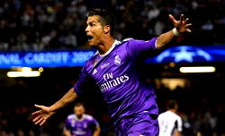 Ronaldo marks milestone, in-form Kane fires Spurs