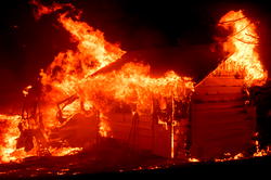 Thousands flee California fires, state of emergency in British Columbia