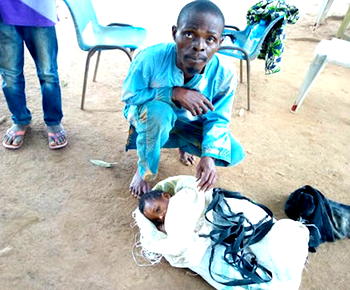 7-yr-old girl tied up in sack, dumped  on roadside by father, step-mother
