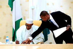 Video: Buhari signs agreements on extradition, others