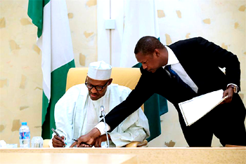 Video: Buhari signs agreements on extradition, others