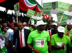 Photos: Fayose in presidential campaign shirt, cap at PDP’s Natl Convention