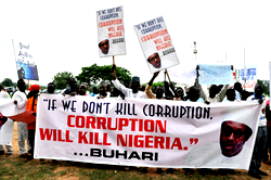 Photos: Protesters storm Unity Fountain, Abuja in support of President Buhari