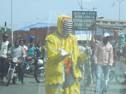 Masquerade, followers cart away chickens, foodstuff from Lagos markets