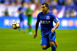 Tevez scores but Shenhua thrashed in Shanghai derby
