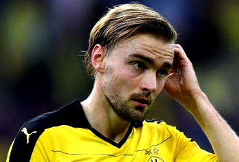 Dortmund captain Schmelzer out of Spurs clash