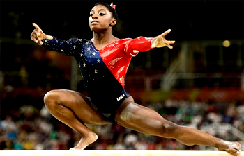 Gymnastics: Biles chooses new coach for comeback
