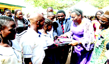 Foundation awards scholarship to 5 students, donates bags, books to 24