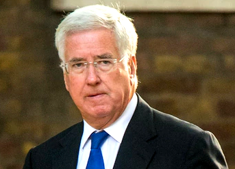 Britain’s May replaces defence minister in growing harassment scandal