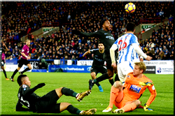 Sterling sends City eight points clear, Sanchez lifts Arsenal