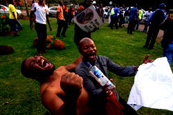 Photos: Zimbabweans celebrate after Robert Mugabe’s resignation