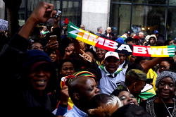 Army says looting almost crumbled Zimbabwe