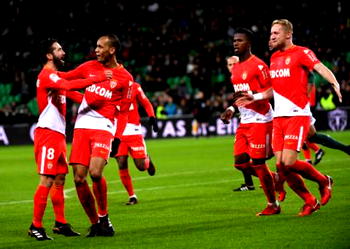Monaco hit four to stay in PSG chase