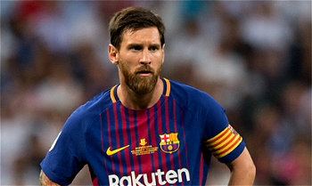 Barcelona stroll past Malaga without Messi
