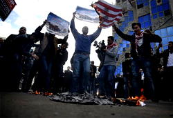 U.S. students demonstrate to warn against dangers of isolation