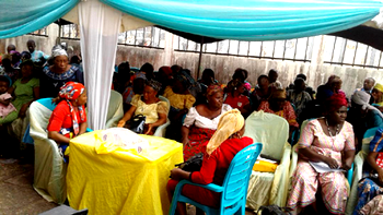Knights fete destitute/widows for Christmas