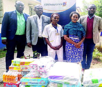 From right: Emeka Dibia, Chief Human Resources Officer, FBNInsurance; Vivian Osuntokun, Administrator; a caregiver, Heritage Homes; Raymond Akalonu, Head, Enterprise Risk Management, FBNInsurance and Olaitan Osonubi, Head, Island Region, FBNGeneral Insurance during the visit to Heritage Homes, Lagos.