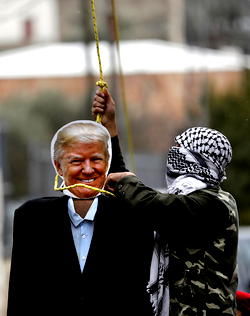Photos: Palestinians hang puppet bearing  US President Trump’s portrait