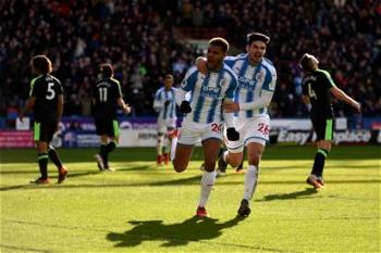 Mounie brace lifts Huddersfield out of trouble