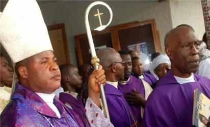 Bishop Peter Ebere Okpaleke, (left)