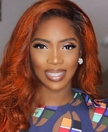 African Bad Girl @tiwasavage looked stunning in this bright red