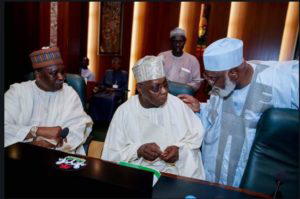 Former heads of state, Obasanjo, Gowon, Abubakar exchanging pleasantries ahead of the National Council of State Meeting at the State House,