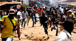 Irate youths attack police station, set vehicles ablaze in Zamfara