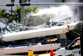 Photos: Footbridge collapses over Miami highway, fatalities