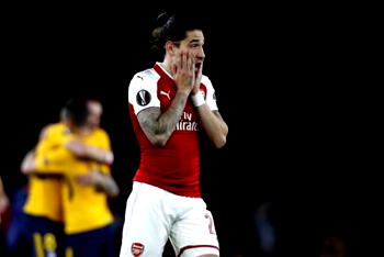 Profligate Arsenal punished by 10-man Atletico Madrid