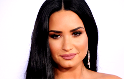 Demi Lovato causes stir with sensual concert romp