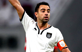 Spanish great Xavi to play on until at least end of year