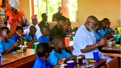 Video: Osinbajo, Akeredolu, others eat with school pupils